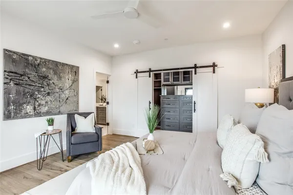 a bedroom with double bed and a window
