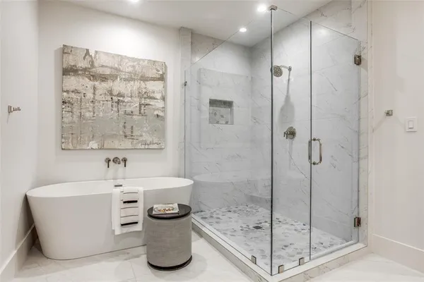 a bathroom with a double vanity sink mirror and toilet
