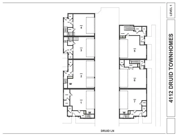an aerial view of a house with a lake view