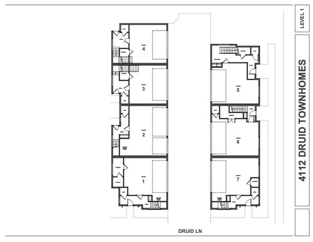 an aerial view of a house with a lake view