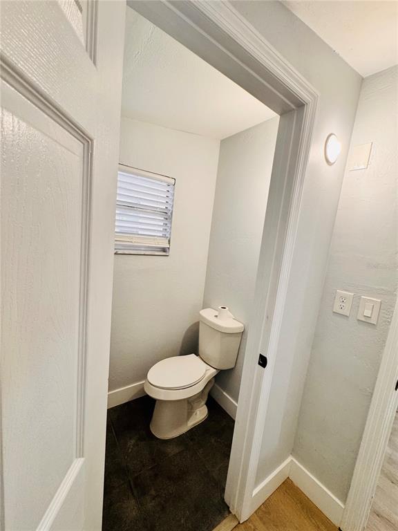 2837 18th Avenue North St. Petersburg, FL 33713 - Photo 14 of 28 a bathroom with a sink and a toilet