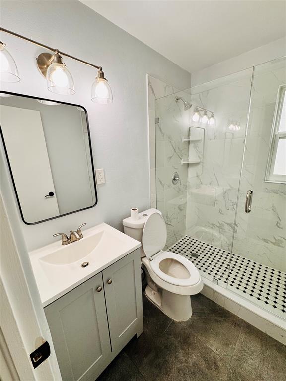 2837 18th Avenue North St. Petersburg, FL 33713 - Photo 23 of 28 a bathroom with a sink toilet and shower