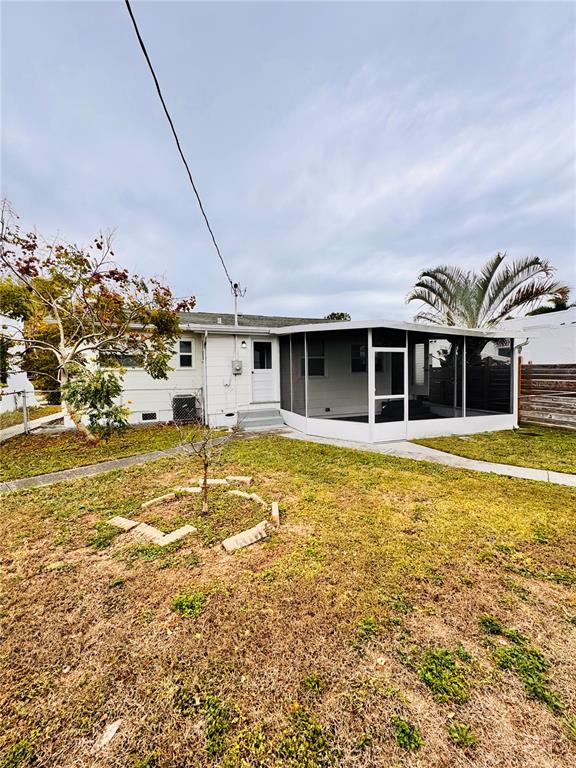 2837 18th Avenue North St. Petersburg, FL 33713 - Photo 26 of 28 a swimming pool with outdoor seating and yard
