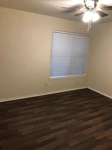 a view of a backyard of the house