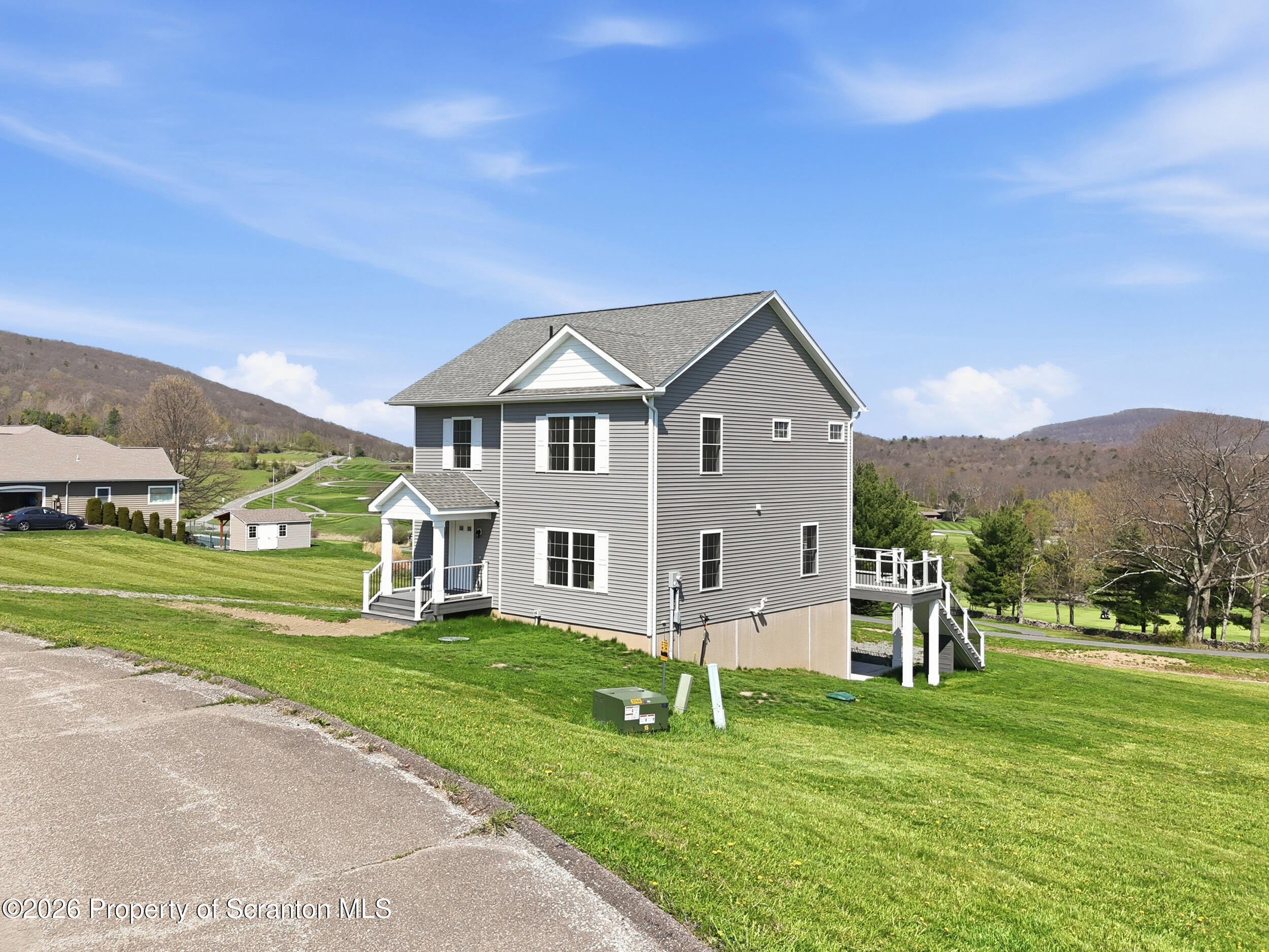 167 Braemar Terrace Tunkhannock, PA 18657 - Photo 2 of 41 a front view of a house with a yard