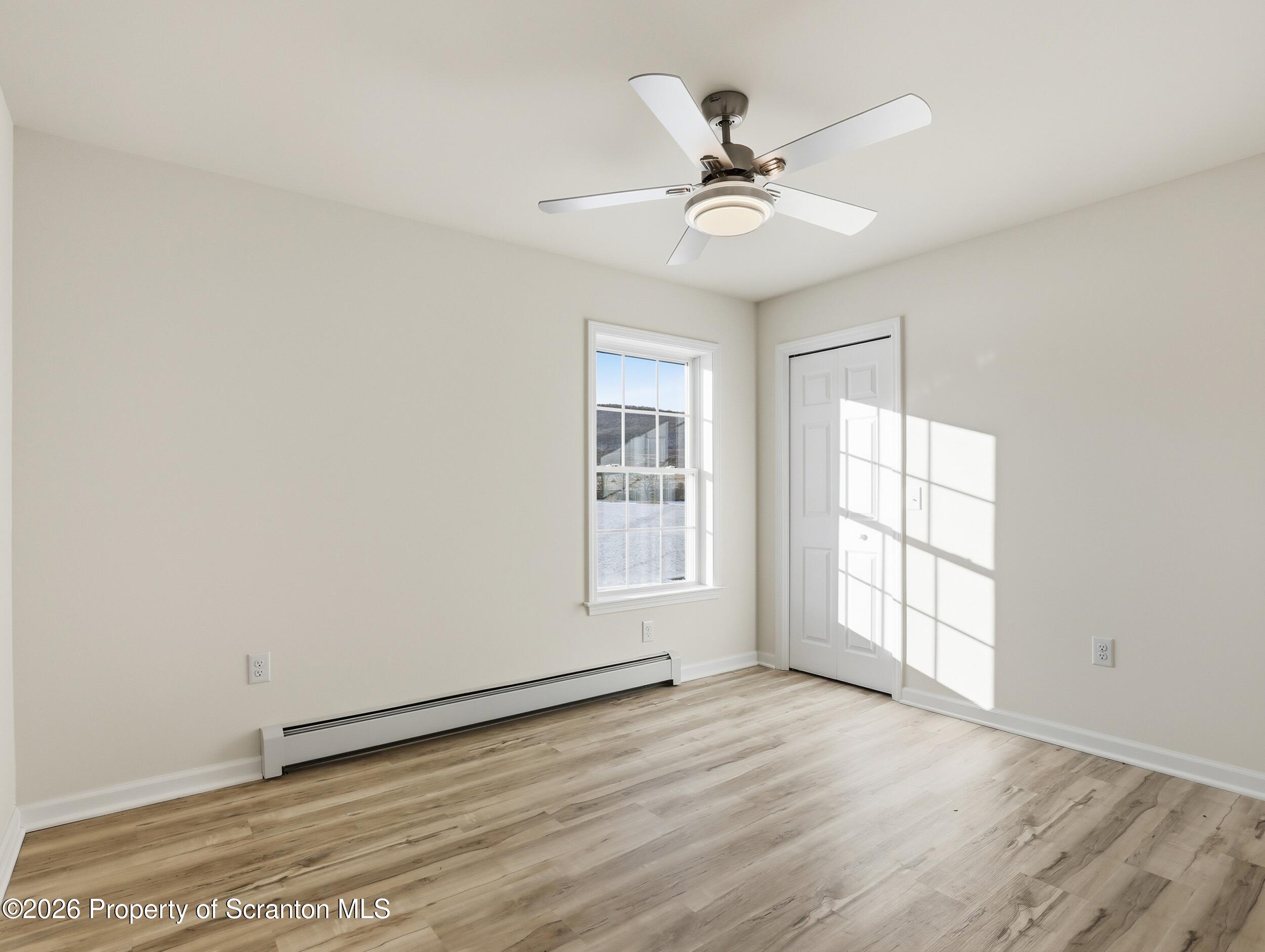 167 Braemar Terrace Tunkhannock, PA 18657 - Photo 26 of 41 wooden floor in an empty room with a window