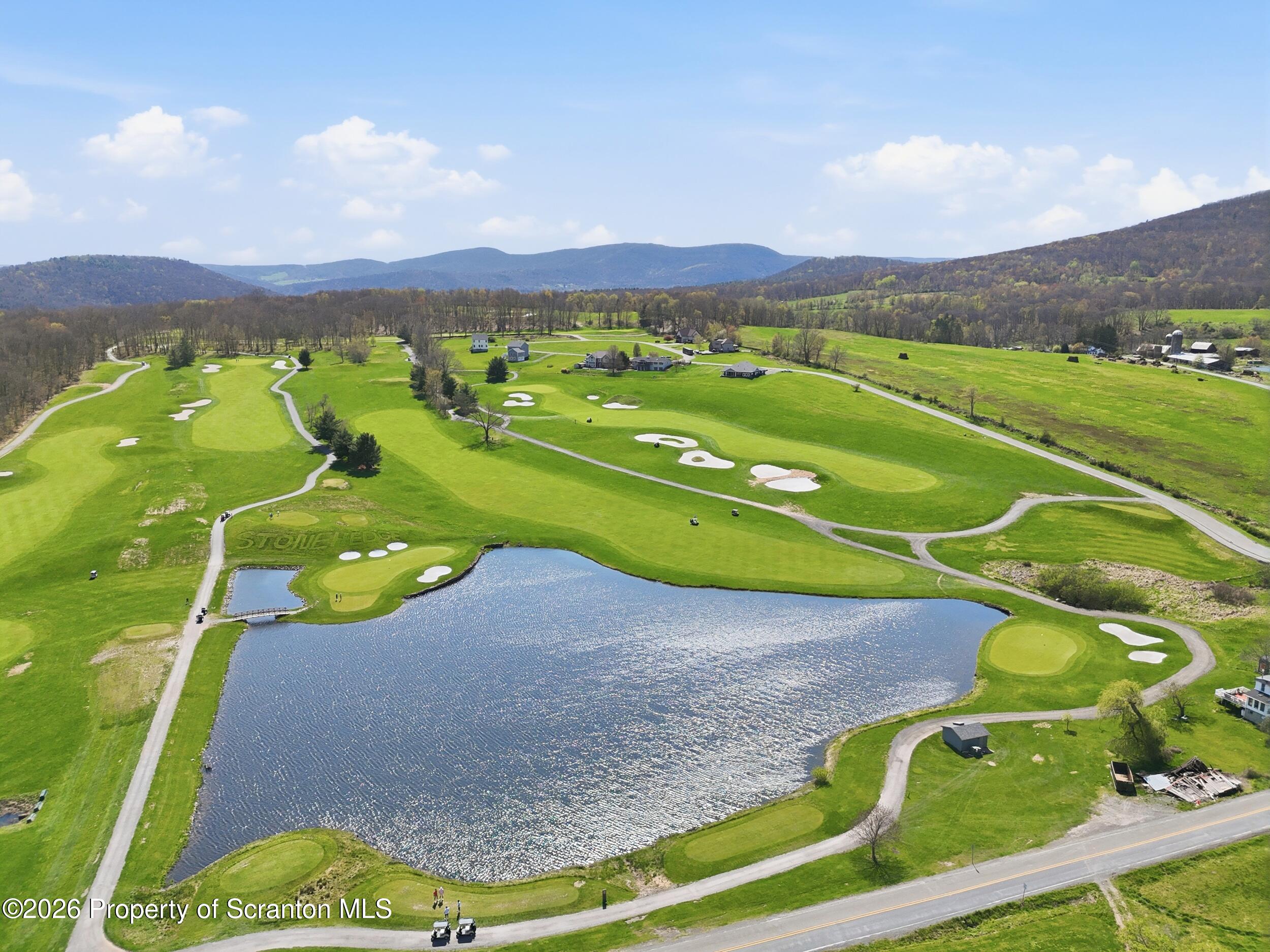 167 Braemar Terrace Tunkhannock, PA 18657 - Photo 39 of 41 an aerial view of a golf course with parking space
