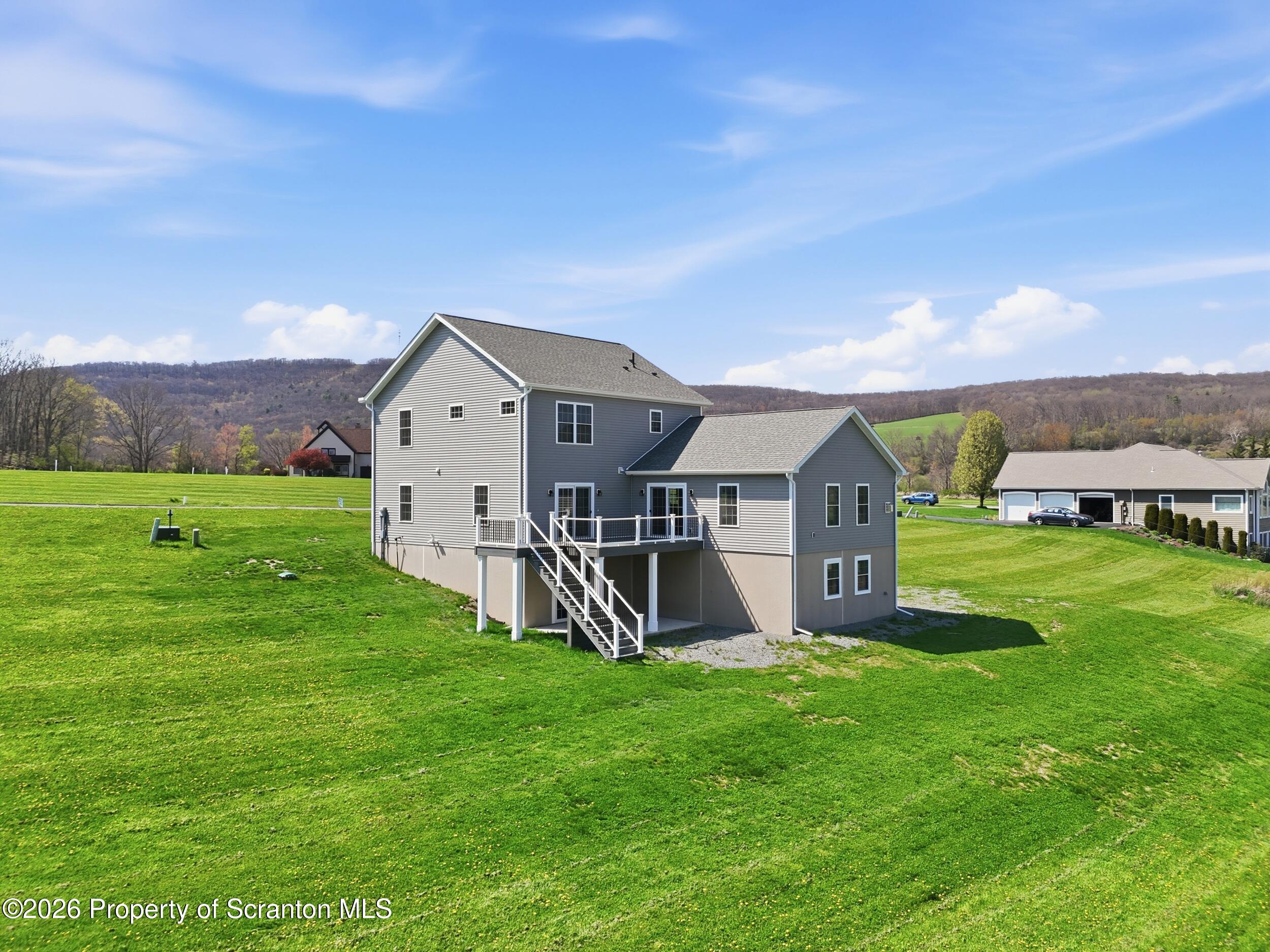 167 Braemar Terrace Tunkhannock, PA 18657 - Photo 4 of 41 a view of a house with backyard and porch
