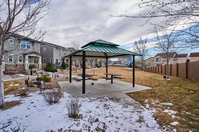 a view of a yard with sitting area