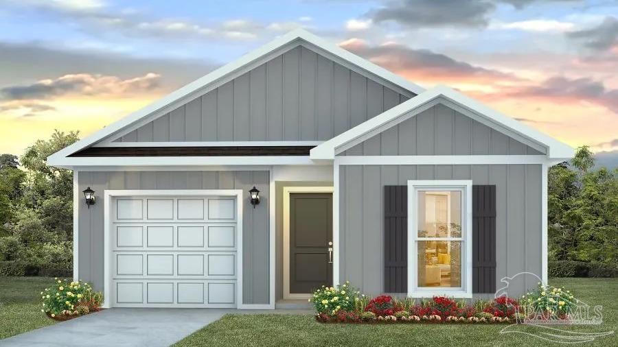 24 Spoonbill Street Cantonment, FL 32533 - Photo 1 of 30 a front view of a house with a garden