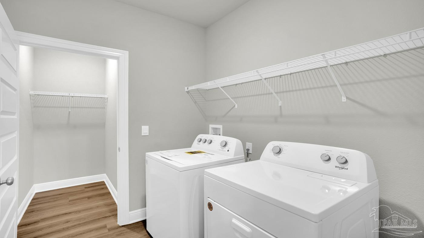 24 Spoonbill Street Cantonment, FL 32533 - Photo 14 of 30 a utility room with dryer and washer