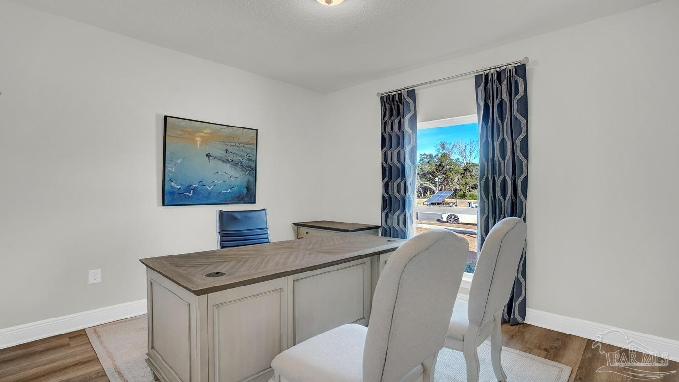 24 Spoonbill Street Cantonment, FL 32533 - Photo 15 of 30 a view of workspace with furniture and window