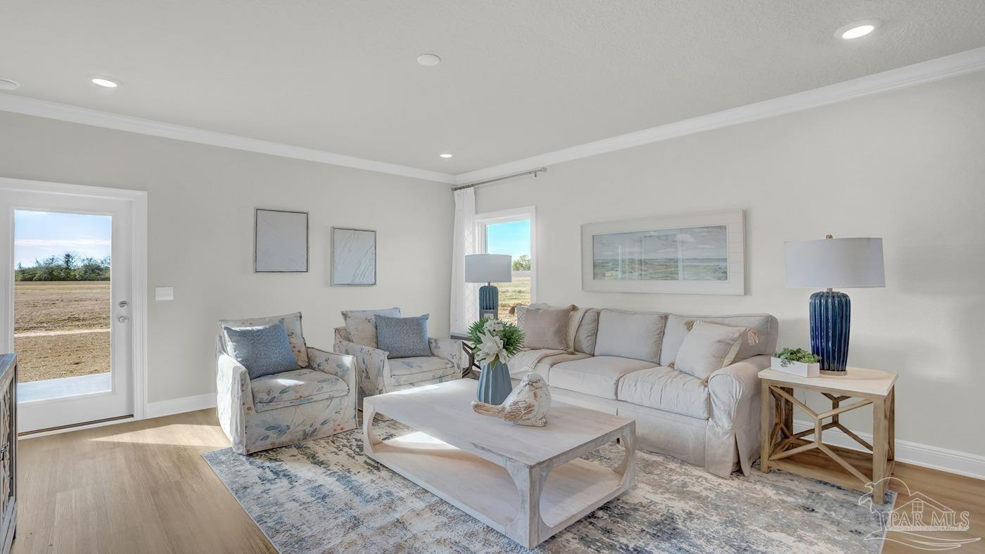 24 Spoonbill Street Cantonment, FL 32533 - Photo 23 of 30 a living room with furniture and a couch
