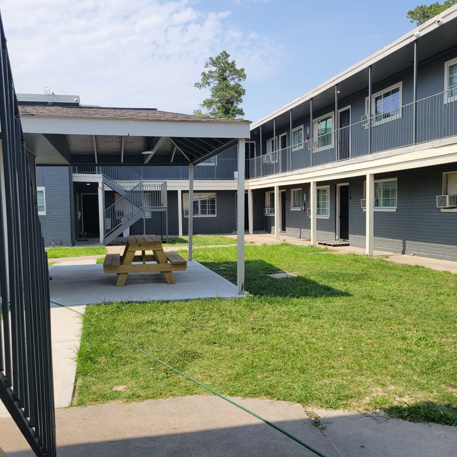 4525 Weaver Road, Unit 19 Houston, TX 77016 - Photo 3 of 20 a view of a house with swimming pool and a yard