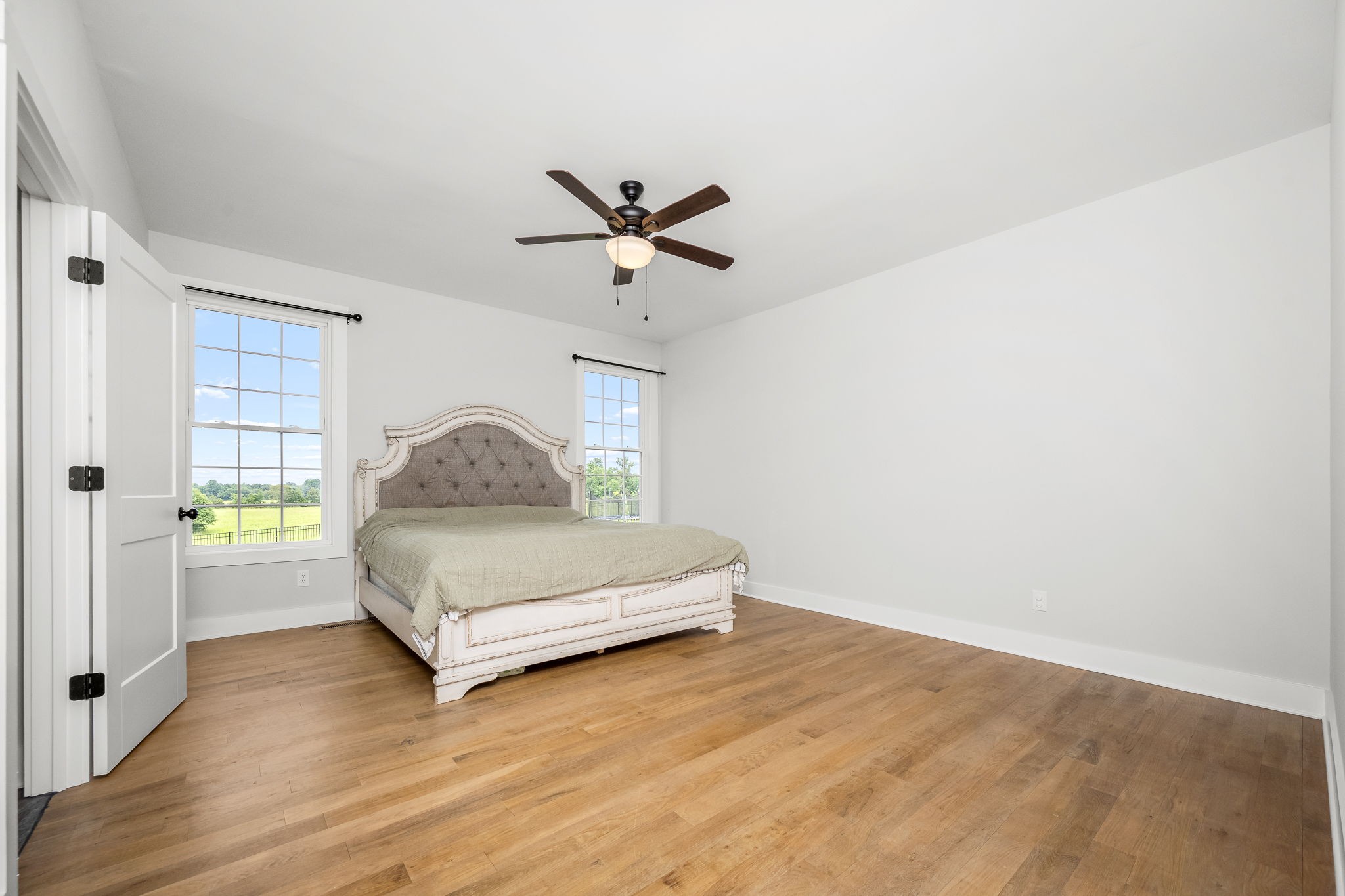3880 Short Mountain Road Woodbury, TN 37190 - Photo 23 of 59 a living room with a bed furniture and a window