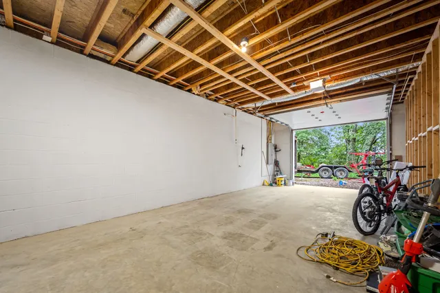 a view of a patio with a table and chairs