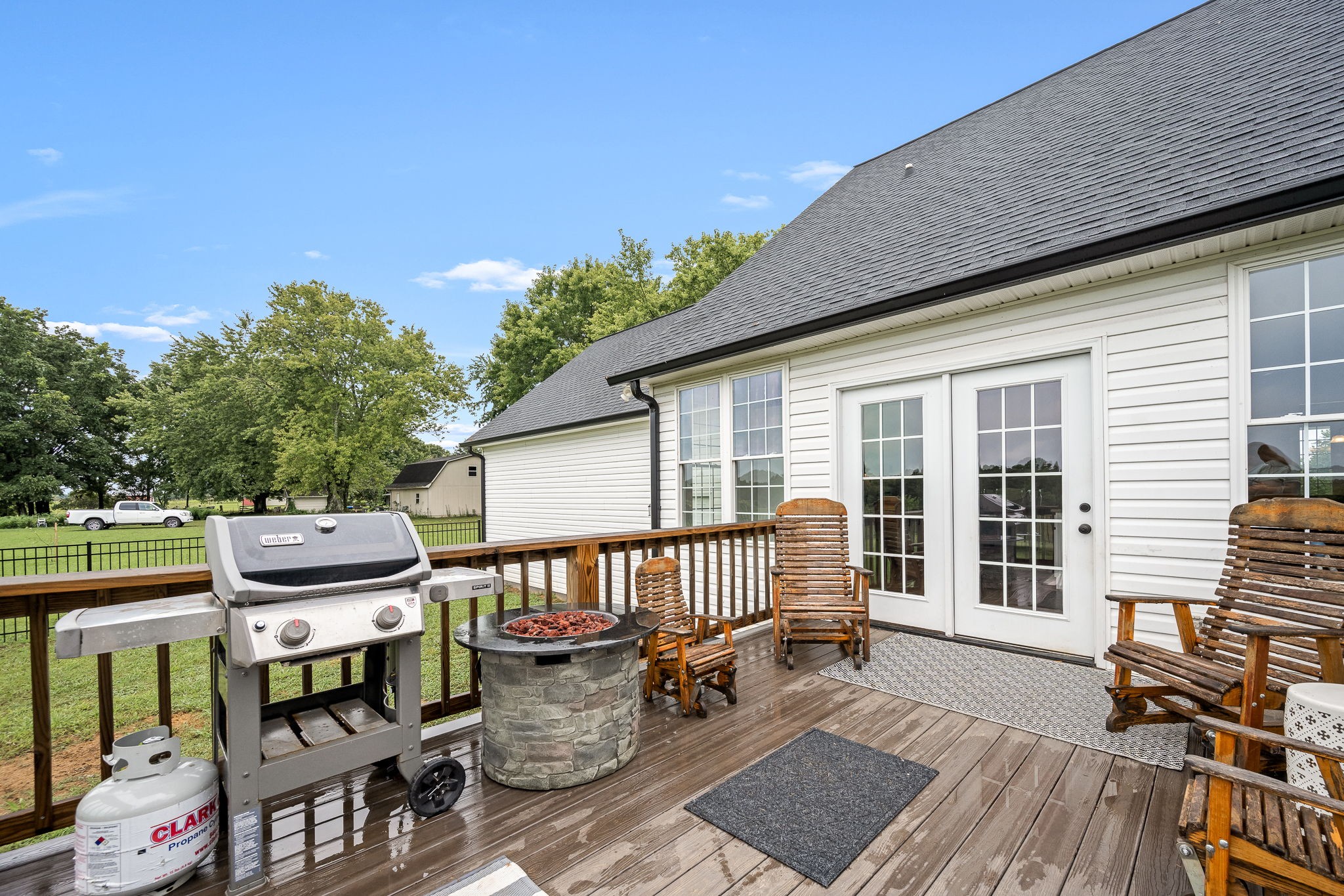 3880 Short Mountain Road Woodbury, TN 37190 - Photo 45 of 59 a view of a patio with a table and chairs