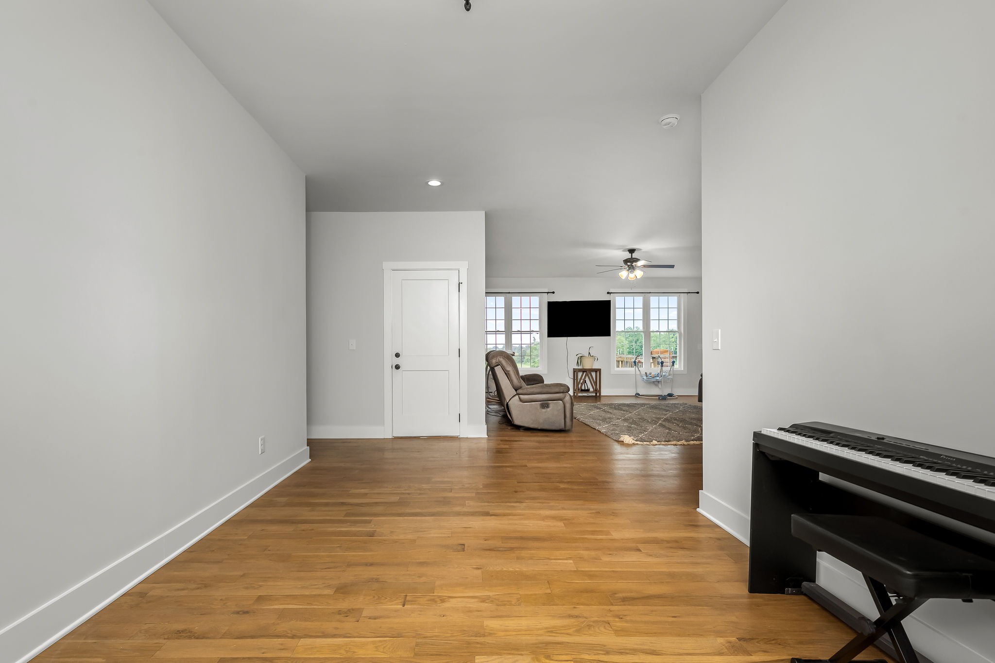 3880 Short Mountain Road Woodbury, TN 37190 - Photo 10 of 59 a living room with furniture and a flat screen tv