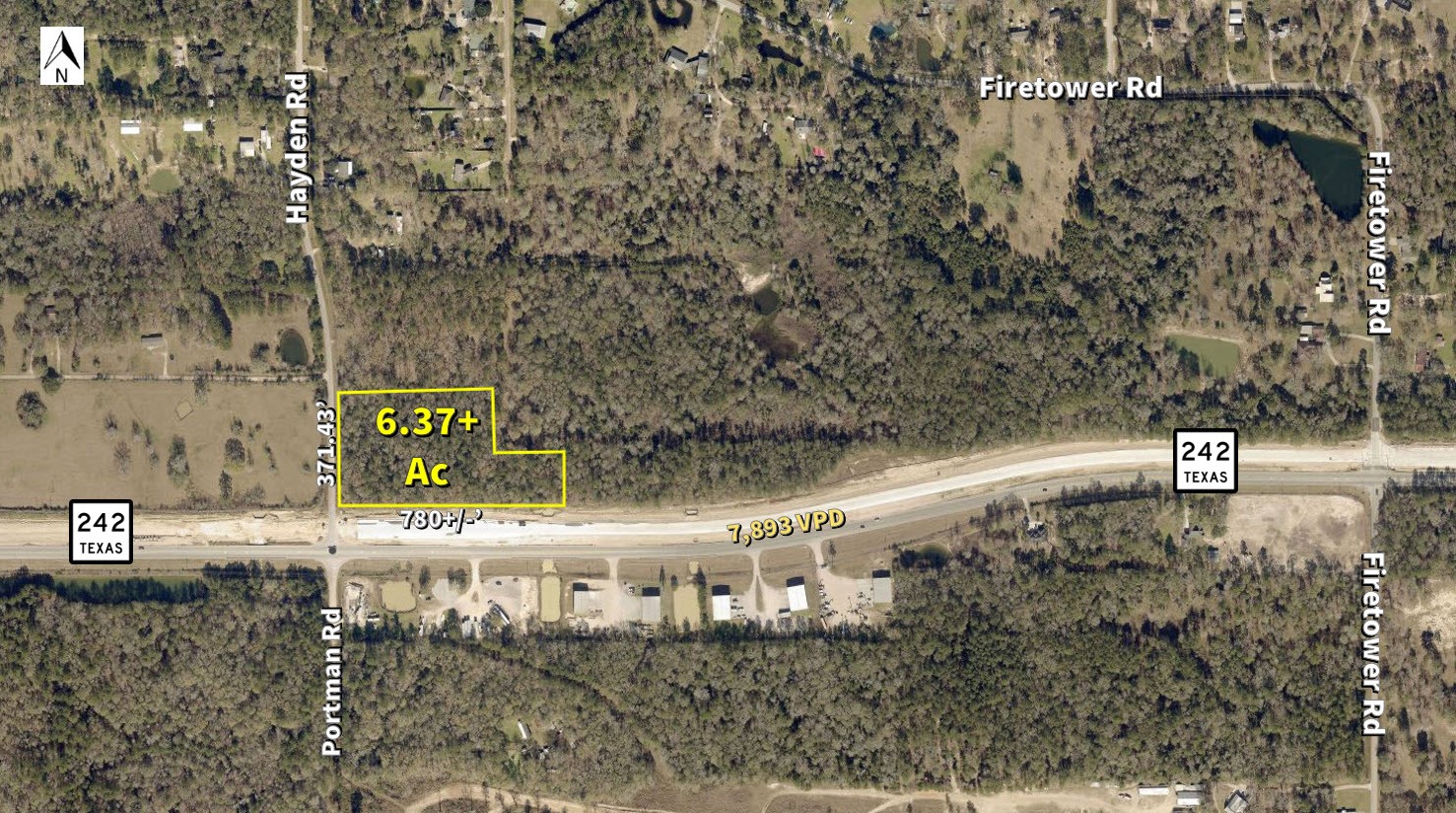 19911 Highway 242 Conroe, TX 77306 - Photo 4 of 9 a view of a street with houses