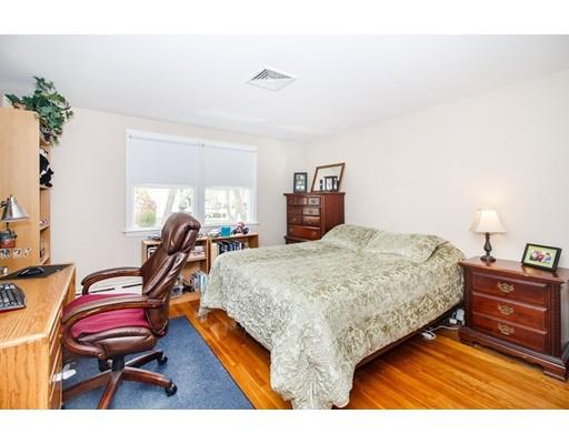 9 Sandrick Road Belmont, MA 02478 - Photo 14 of 21 a bedroom with furniture and a wooden floor