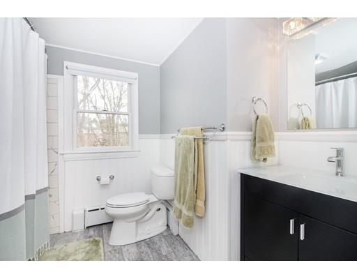 9 Sandrick Road Belmont, MA 02478 - Photo 15 of 21 a bathroom with a sink toilet and window