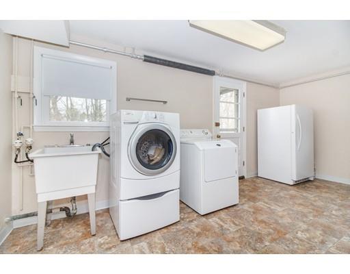 9 Sandrick Road Belmont, MA 02478 - Photo 16 of 21 a utility room with dryer and washer