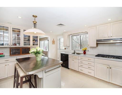 9 Sandrick Road Belmont, MA 02478 - Photo 6 of 21 a kitchen with stainless steel appliances granite countertop a stove refrigerator and cabinets