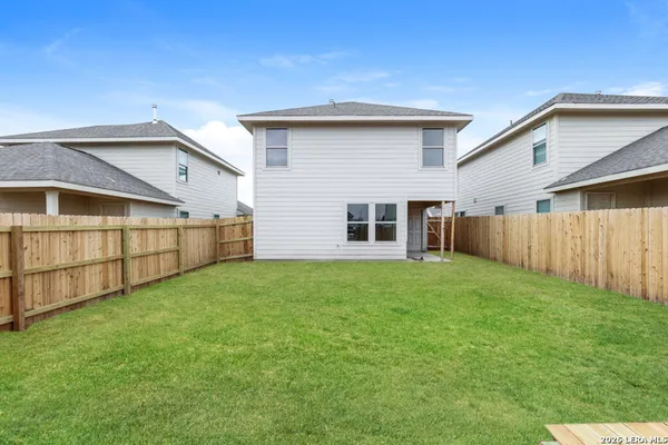 a view of a backyard with a garden