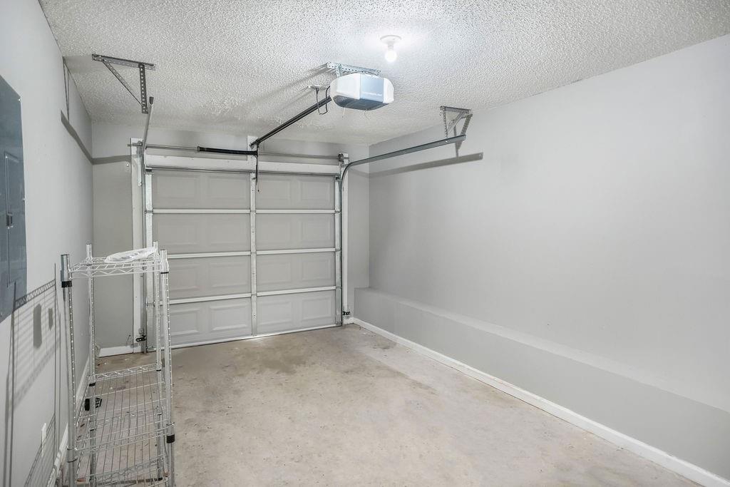 6947 Gallant Circle Southeast, Unit 10 Mableton, GA 30126 - Photo 23 of 26 a view of a room with racks on the wall