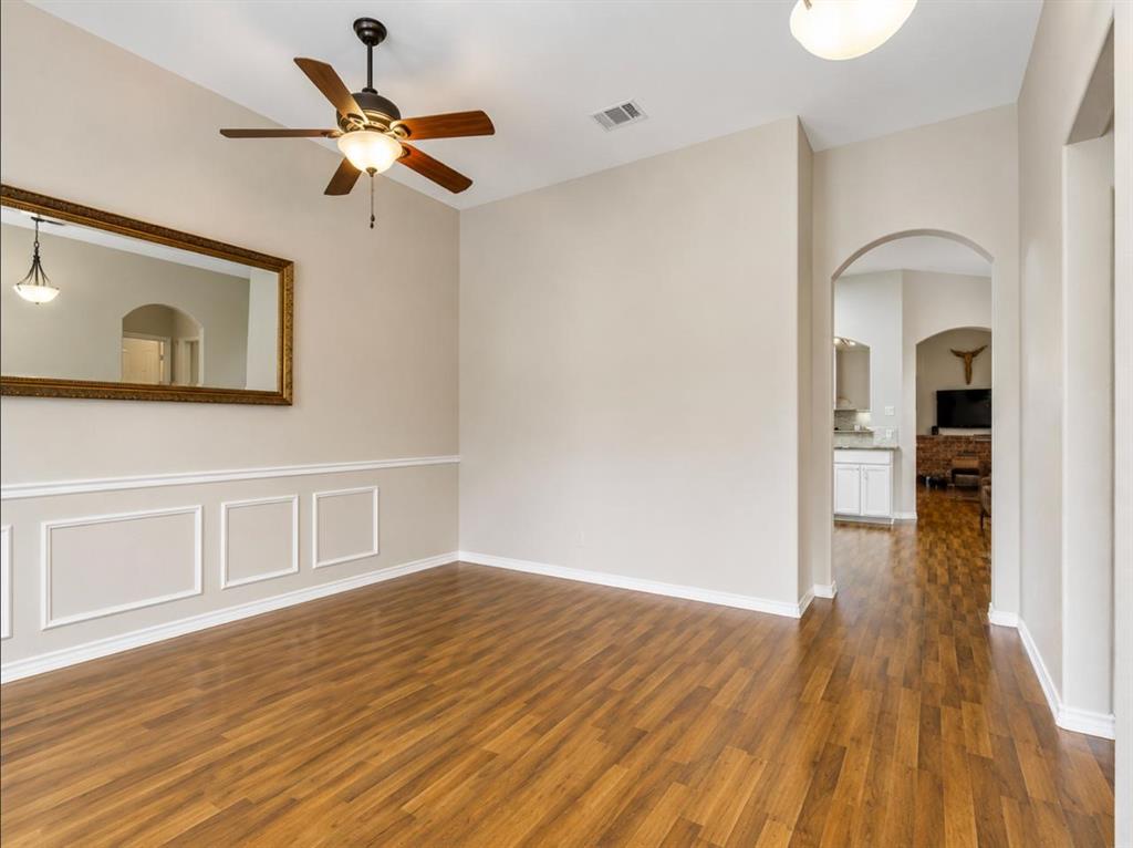 9962 Bell Rock Road Frisco, TX 75035 - Photo 3 of 28 a view of empty room with wooden floor