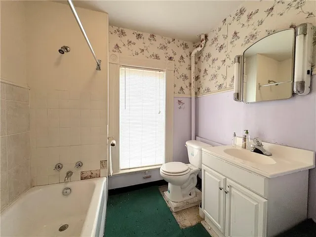 a bathroom with a sink and a bathtub