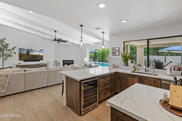 a kitchen with a stove and a fireplace
