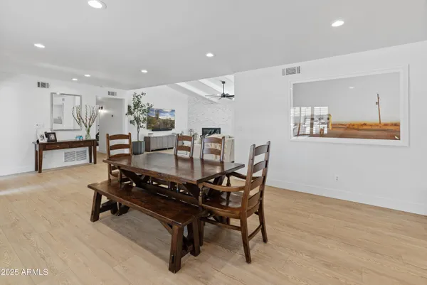 a living room with furniture and a table