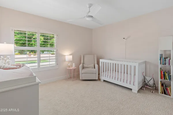 a bedroom with furniture and a bed