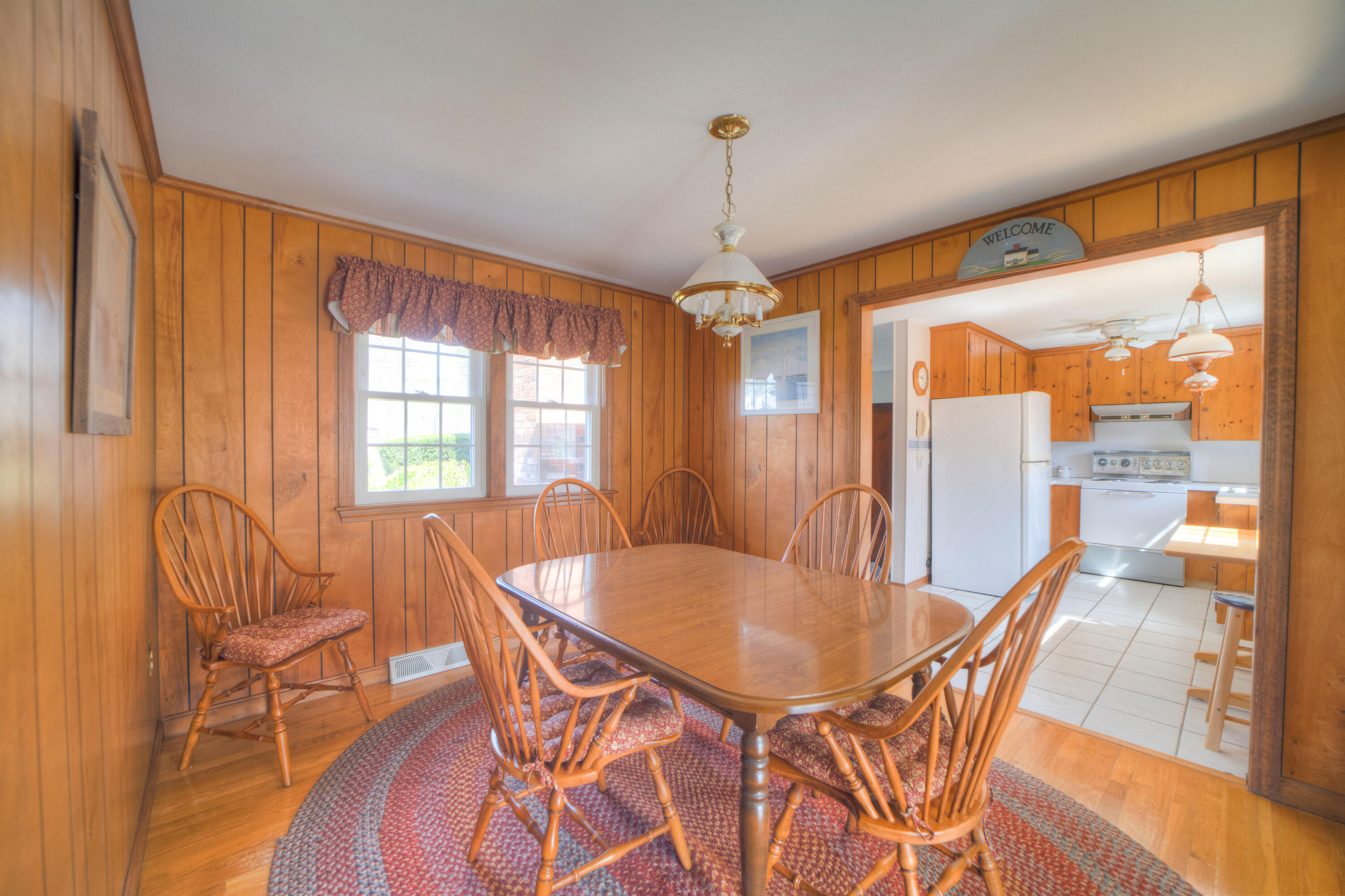 132 Indian Pond Road West Dennis, MA 02670 - Photo 14 of 21 a view of a dining room with furniture window and outside view