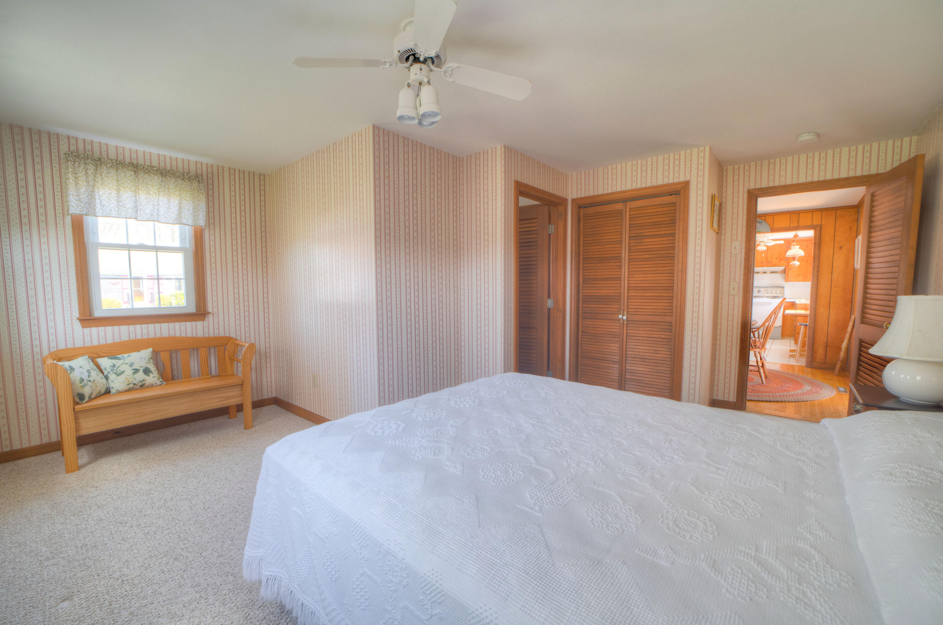 132 Indian Pond Road West Dennis, MA 02670 - Photo 17 of 21 a bedroom with a bed and a couch