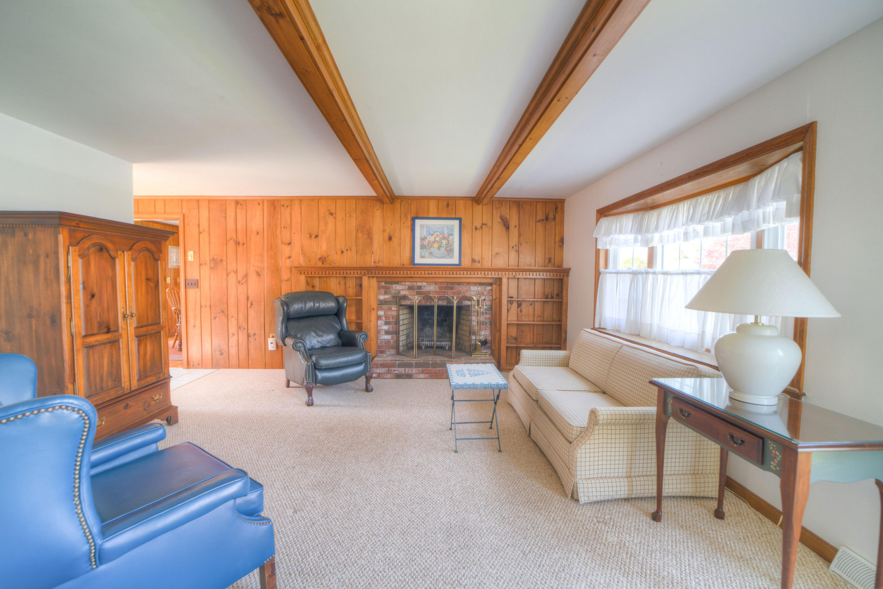 132 Indian Pond Road West Dennis, MA 02670 - Photo 5 of 21 a living room with furniture and a fireplace