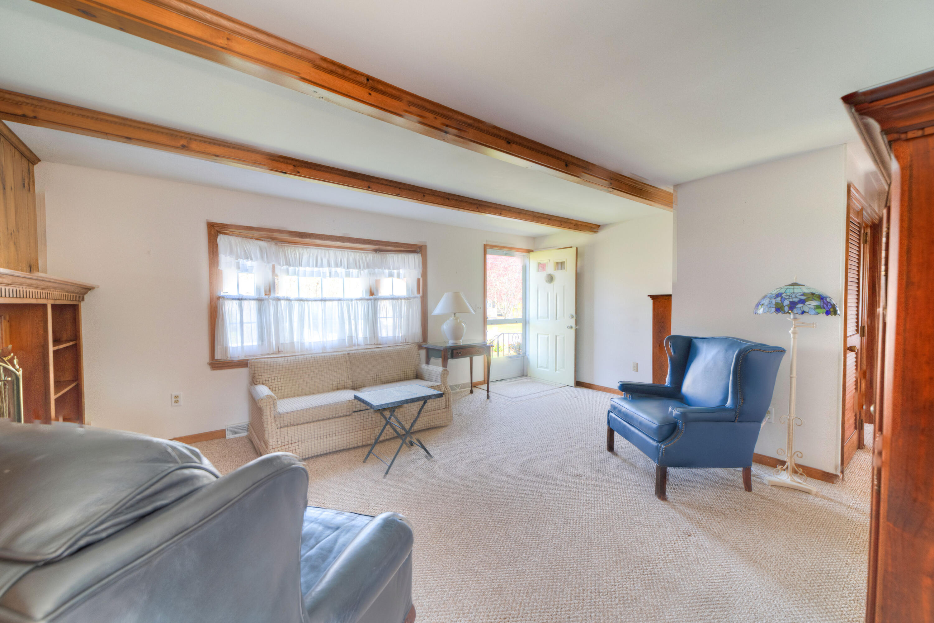 132 Indian Pond Road West Dennis, MA 02670 - Photo 7 of 21 a living room with furniture and a window
