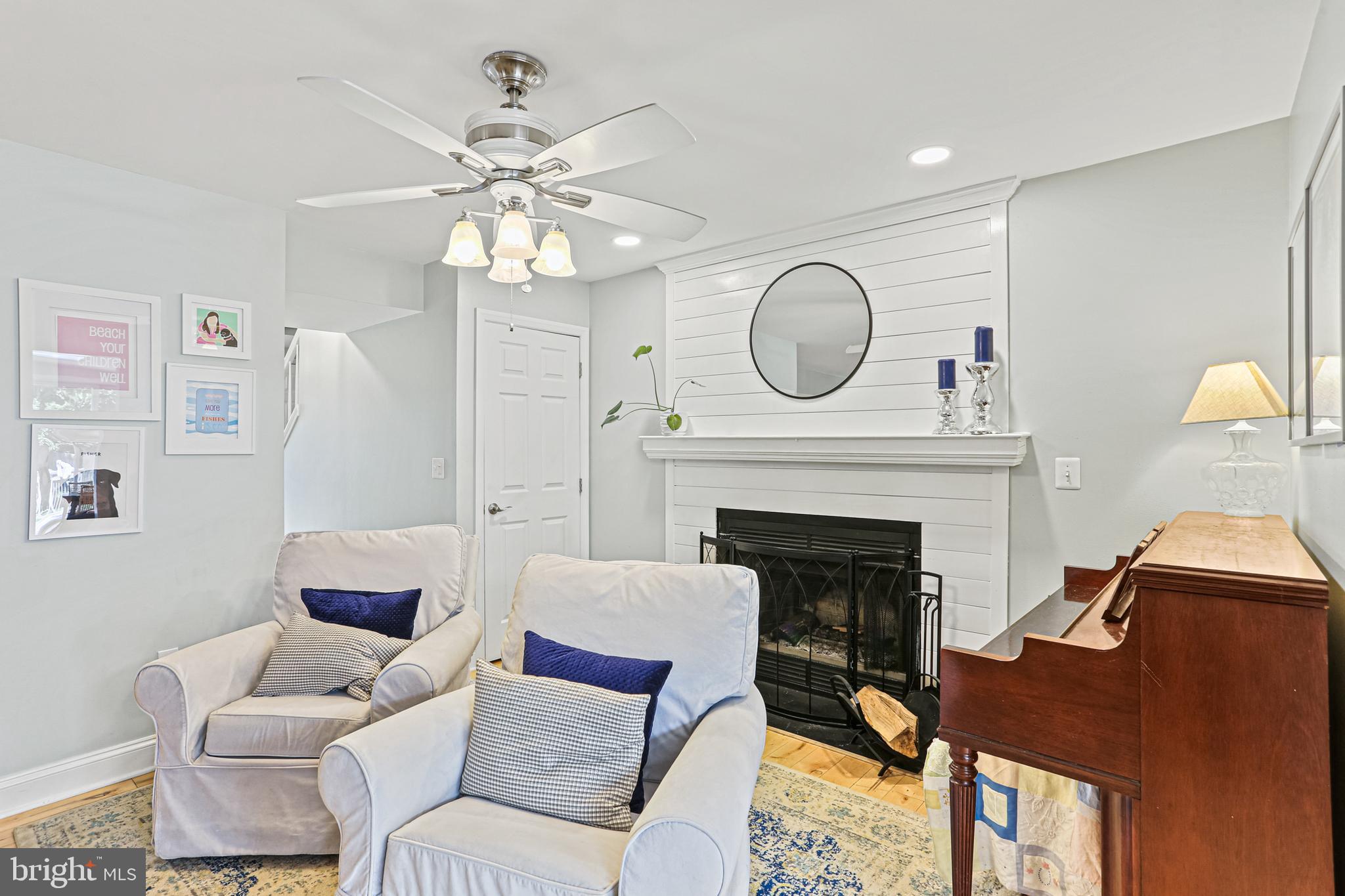 1348 Fishing Creek Road Annapolis, MD 21403 - Photo 10 of 35 Sitting area with wood burning fireplace