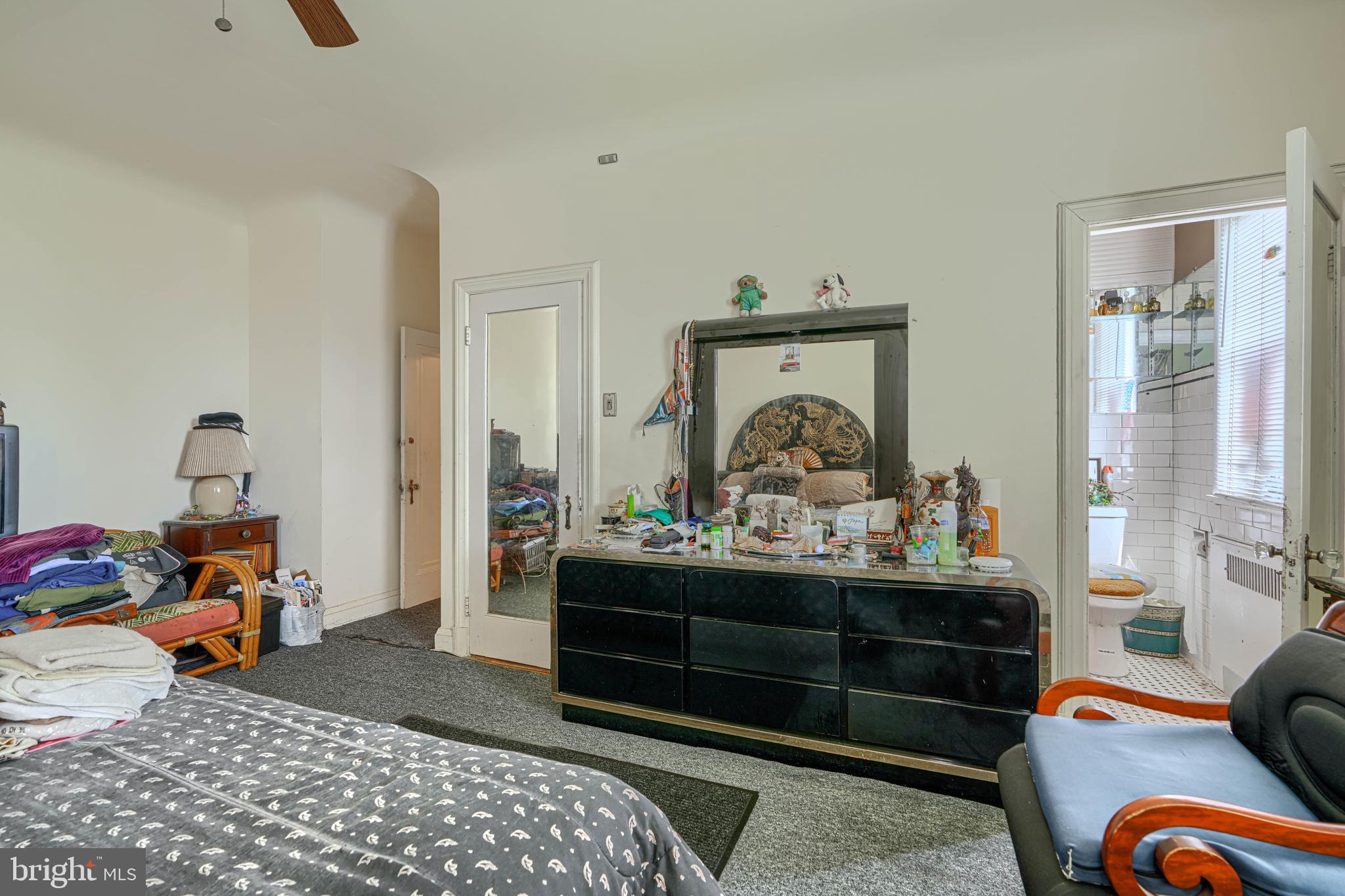 3212 Dorchester Road Baltimore, MD 21215 - Photo 21 of 45 a bedroom with furniture and a window