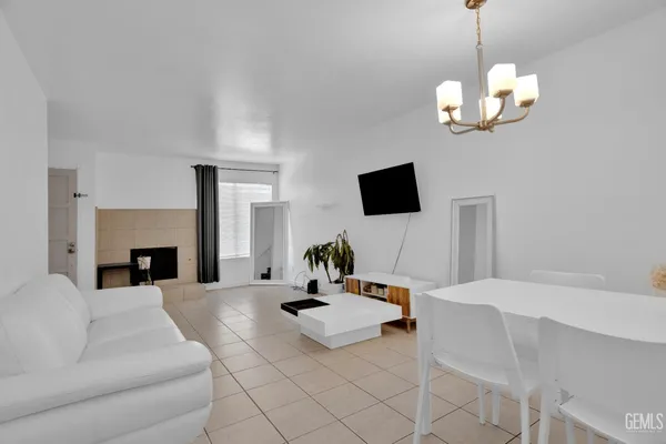 a kitchen with stainless steel appliances a stove sink and microwave