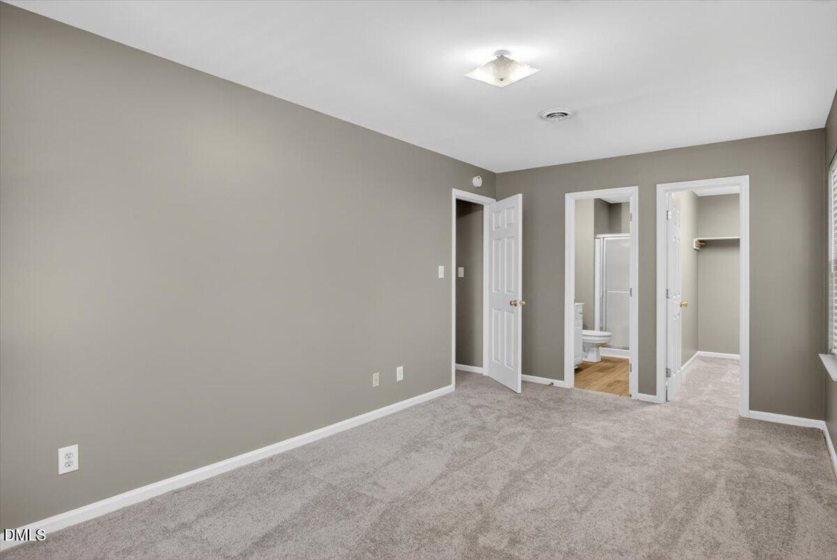 1630 Oxford Road, Unit F Henderson, NC 27536 - Photo 15 of 33 an empty room with closet area