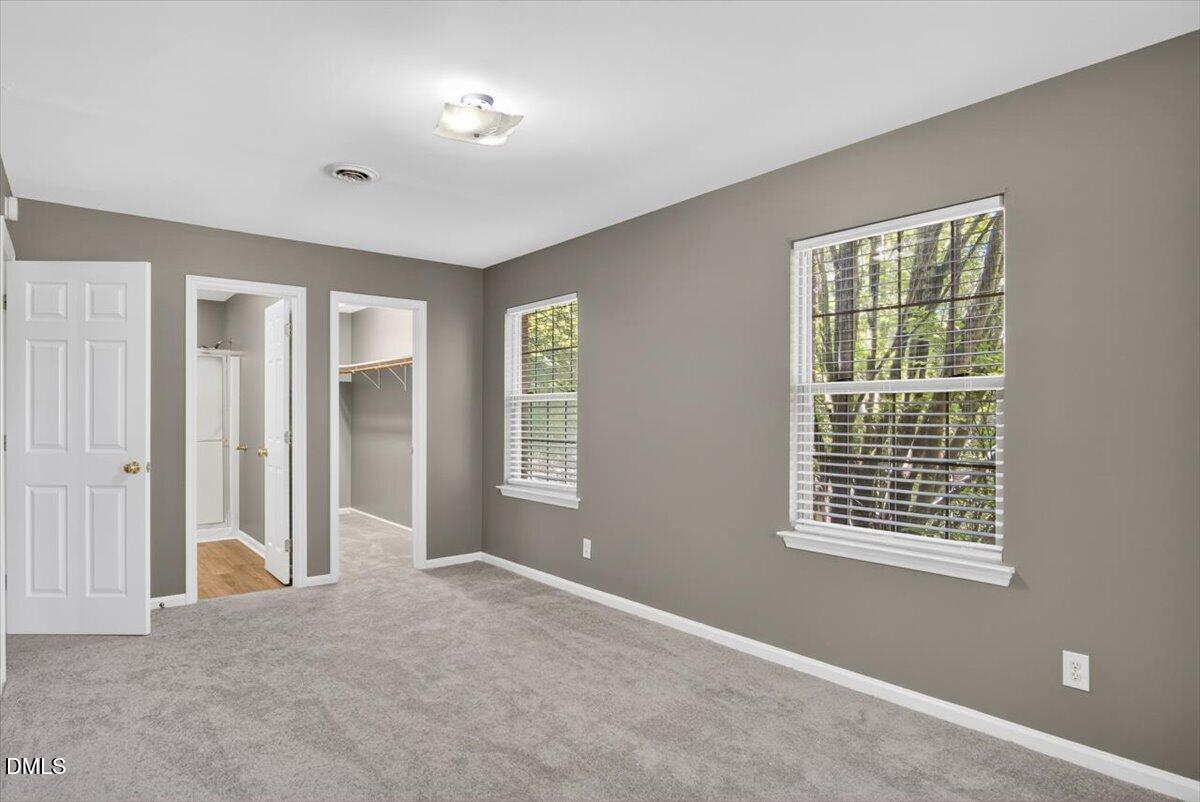 1630 Oxford Road, Unit F Henderson, NC 27536 - Photo 16 of 33 a view of an empty room with a window