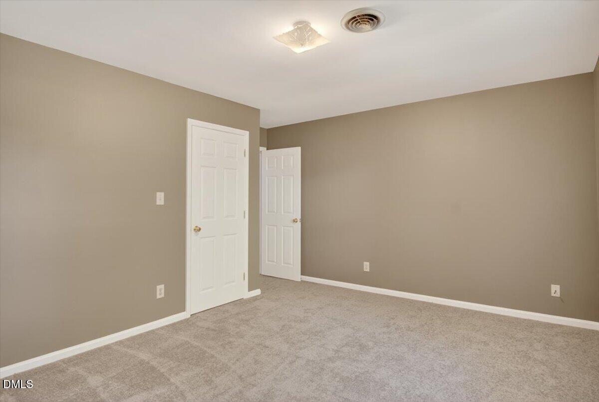 1630 Oxford Road, Unit F Henderson, NC 27536 - Photo 20 of 33 a view of an empty room