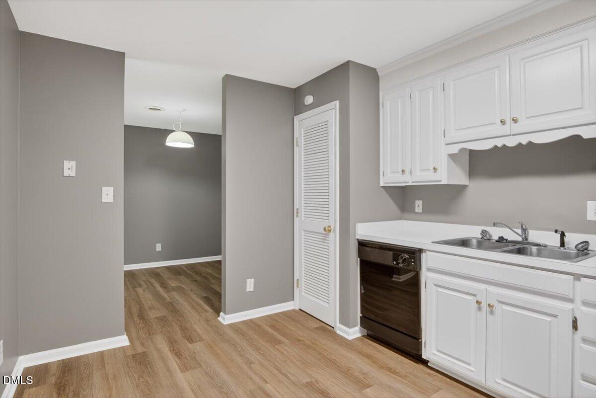 1630 Oxford Road, Unit F Henderson, NC 27536 - Photo 10 of 33 a kitchen with a sink cabinets and appliances