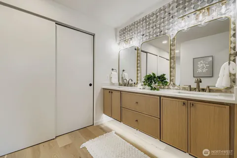 a bathroom with a sink and mirror