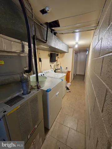 a storage room with washer and dryer