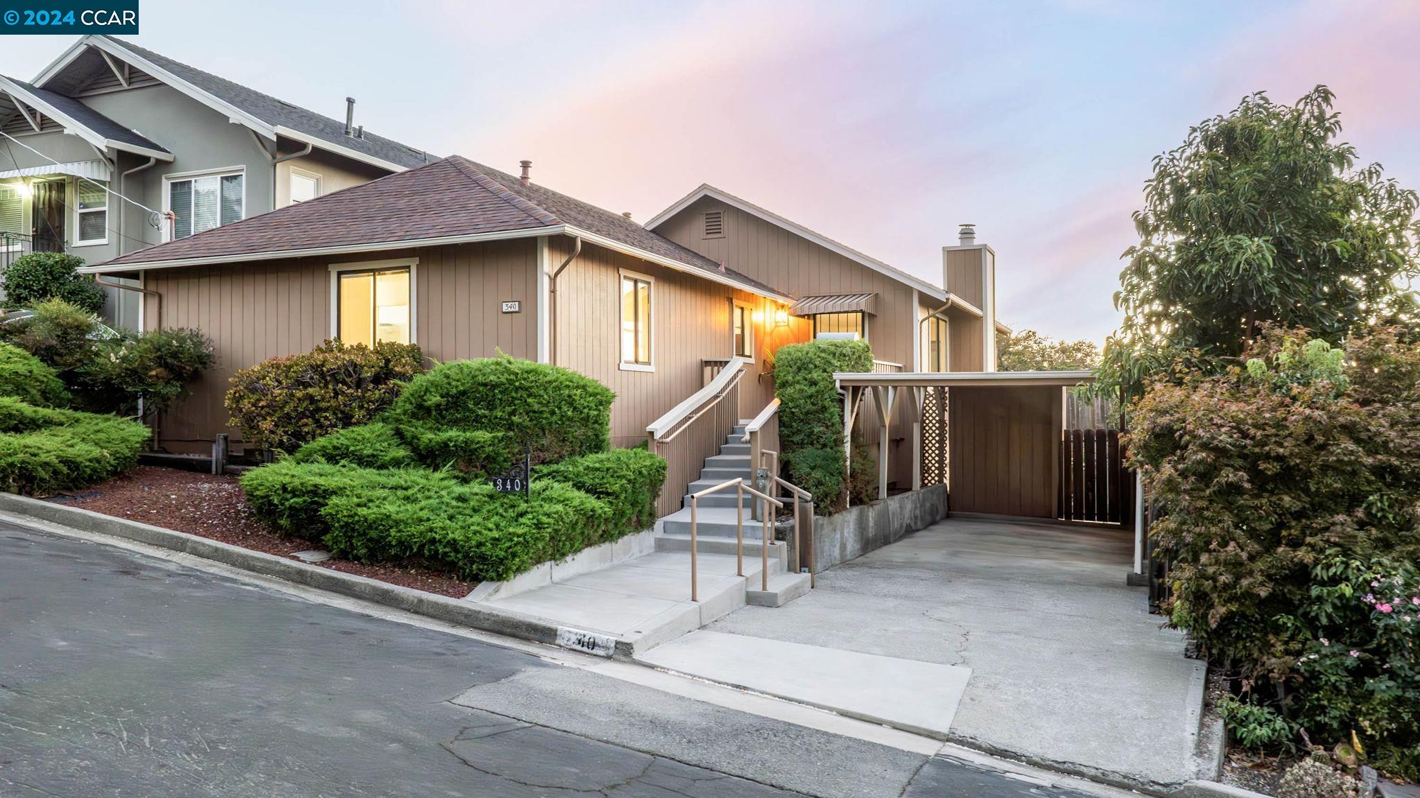 340 Napa Avenue Rodeo, CA 94572 - Photo 1 of 1 a view of a house with a small yard and plants
