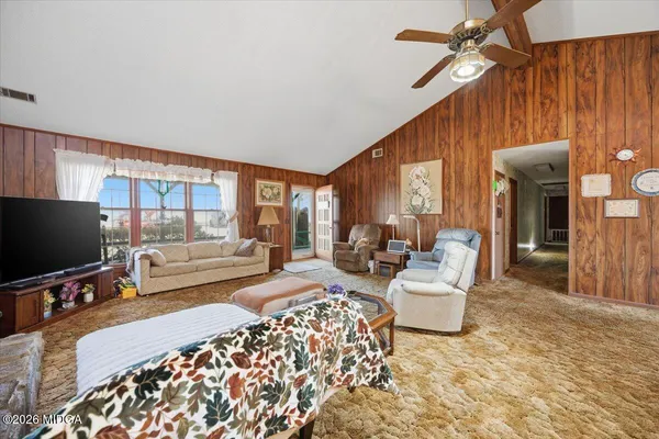 a bed room with two bed and a window