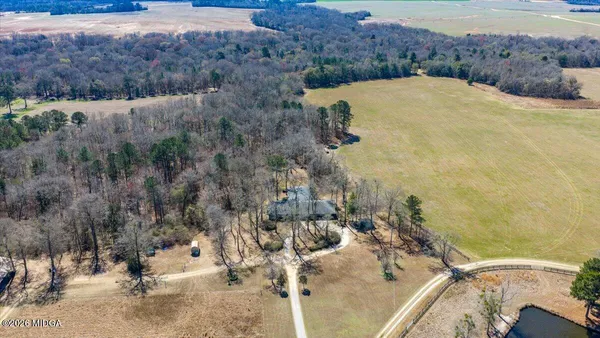 a view of a backyard of the house